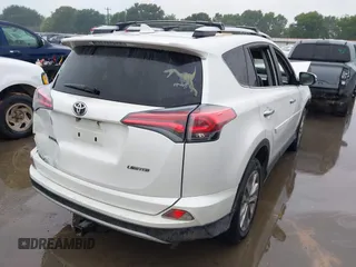 2016 Toyota RAV4 Limited with VIN JTMYFREV6GJ061593, listed as a IAAI auction lot 42188936 with 180,361 mi miles and . Bid and sale history available at DreamBid. Image 4.