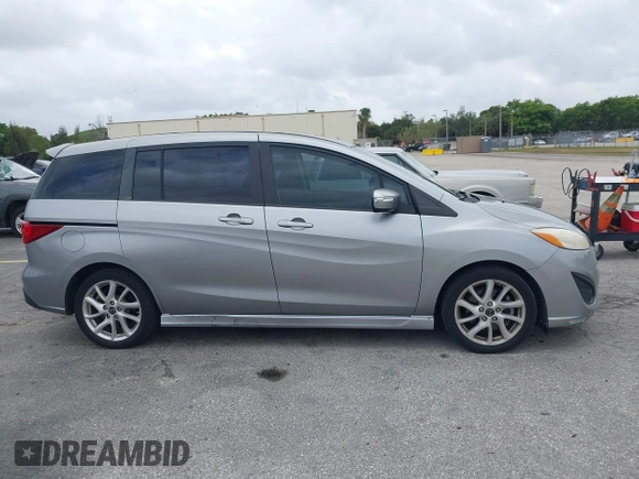 2013 Mazda 5 Touring with VIN JM1CW2CL5D0160104, listed as a IAAI auction lot 41722470 with 135,708 mi miles. Bid and sale history available at carsss.com. Image 13.