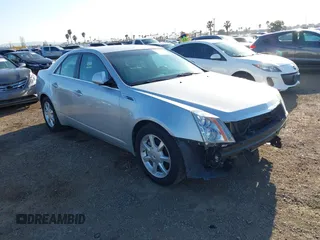 2009 Cadillac CTS RWD w/1SA with VIN 1G6DF577690144779, listed as a IAAI auction lot 41846426 with 89,445 mi miles. Bid and sale history available at carsss.com. Image 1.