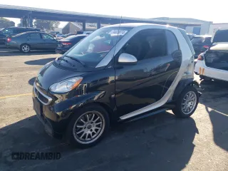 2013 Smart fortwo Pure with VIN WMEEJ3BA4DK586076, listed as a Copart auction lot 74323074 with 27,131 mi miles and Salvage Title. Bid and sale history available at carsss.com. Image 1.