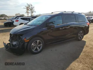 2020 Honda Odyssey Touring with VIN 5FNRL6H87LB007609, listed as a Copart auction lot 84562954 with 22,763 mi miles and Salvage Title. Bid and sale history available at DreamBid. Image 1.