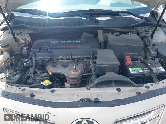 2007 Toyota Camry CE with VIN 4T1BE46KX7U716414, listed as a IAAI auction lot 42116250 with 104,298 mi miles and . Bid and sale history available at DreamBid. Image 10.