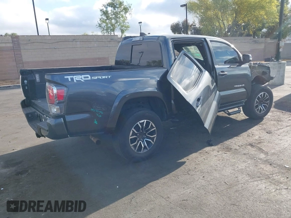 2022 Toyota Tacoma SR5 with VIN 3TMAZ5CN5NM181034, listed as a IAAI auction lot 42243200 with Not provided miles and . Bid and sale history available at DreamBid. Image 4.