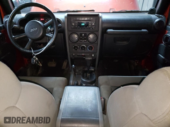 2009 Jeep Wrangler Unlimited X с VIN 1J8GA39139L788480, выставлен на аукционе Copart как лот 63013635 с пробегом 166 007 миль миль и Чистый • Clean title. История ставок и продаж доступна на DreamBid. Изображение 8.