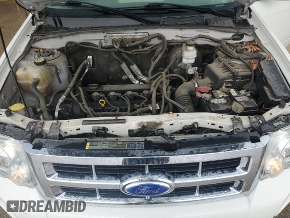 2011 Ford Escape XLS with VIN 1FMCU0C74BKC27897, listed as a Copart auction lot 63084415 with 116,423 mi miles and Clean title. Bid and sale history available at DreamBid. Image 12.