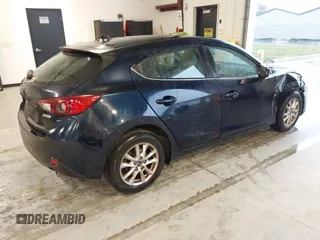 2016 Mazda 3 i Touring with VIN JM1BM1L71G1343674, listed as a IAAI auction lot 41630218 with 70,052 mi miles and . Bid and sale history available at DreamBid. Image 4.