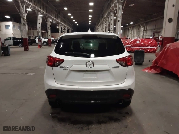 2016 Mazda CX-5 Touring with VIN JM3KE4CY0G0853261, listed as a IAAI auction lot 41861176 with 63,491 mi miles. Bid and sale history available at carsss.com. Image 16.