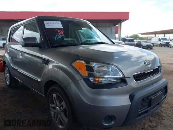 2010 Kia Soul + with VIN KNDJT2A28A7163141, listed as a IAAI auction lot 42035132 with 211,661 mi miles. Bid and sale history available at carsss.com. Image 1.