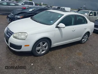2009 Volkswagen Jetta Sedan SE with VIN 3VWRM71K19M076953, listed as a IAAI auction lot 42110365 with 182,208 mi miles. Bid and sale history available at carsss.com. Image 2.
