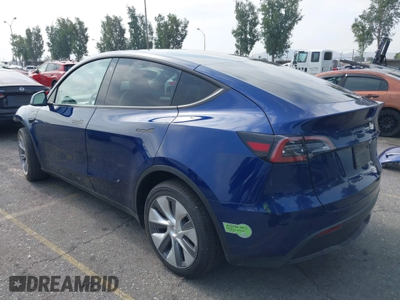 2023 Tesla Model Y Long Range z VIN 7SAYGDEE5PA102285, wystawiony jako IAAI lot #42402981 z przebiegiem 24 550 mil mil oraz . Historia ofert i sprzedaży dostępna na DreamBid. Obrazek 3.