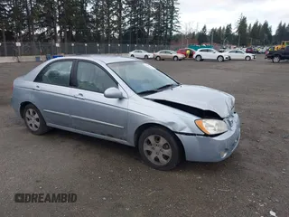 2005 Kia Spectra LX with VIN KNAFE121855132115, listed as a IAAI auction lot 41815955 with 118,887 mi miles. Bid and sale history available at carsss.com. Image 1.