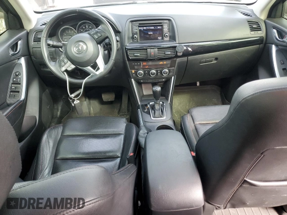 2015 Mazda CX-5 Grand Touring with VIN JM3KE4DY9F0516357, listed as a Copart auction lot 53156215 with 118,621 mi miles and Salvage Title. Bid and sale history available at DreamBid. Image 8.