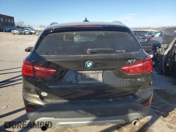 2016 BMW X1 xDrive28i with VIN WBXHT3C36GP880207, listed as a Copart auction lot 82597924 with 145,444 mi miles and Salvage Title. Bid and sale history available at carsss.com. Image 6.