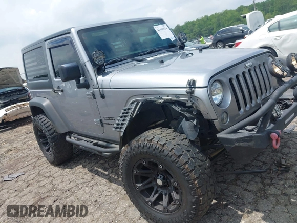 2016 Jeep Wrangler Black Bear with VIN 1C4AJWAG5GL258426, listed as a IAAI auction lot 42400914 with 128,606 mi miles and . Bid and sale history available at DreamBid. Image 1.