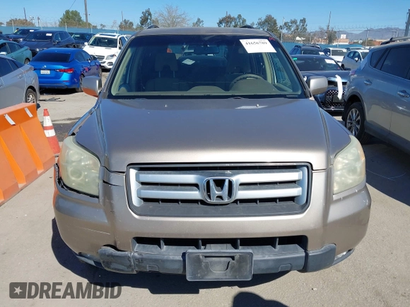 2006 Honda Pilot EX with VIN 5FNYF28416B017534, listed as a IAAI auction lot 41656789 with 241,343 mi miles and . Bid and sale history available at DreamBid. Image 12.