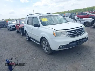 2014 Honda Pilot EX-L with VIN 5FNYF3H50EB005811, listed as a IAAI auction lot 42115804 with 216,033 mi miles and . Bid and sale history available at DreamBid. Image 1.