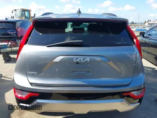 2024 Kia Niro Wind with VIN KNDCR3L11R5122388, listed as a IAAI auction lot 42261311 with 32,475 mi miles and . Bid and sale history available at DreamBid. Image 16.