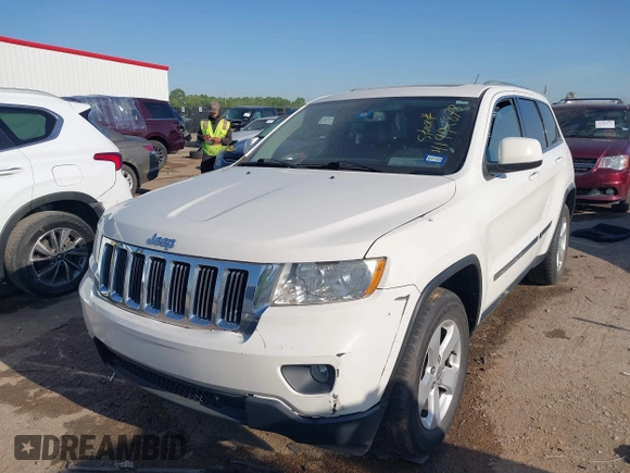 2011 Jeep Grand Cherokee Laredo with VIN 1J4RR4GG4BC703071, listed as a IAAI auction lot 41992878 with 126,199 mi miles and . Bid and sale history available at DreamBid. Image 17.