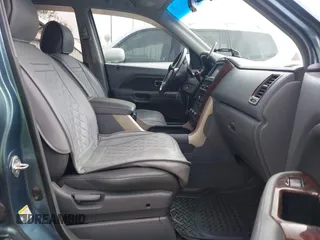 2007 Honda Pilot EX-L with VIN 5FNYF28717B034295, listed as a IAAI auction lot 41631628 with 195,572 mi miles. Bid and sale history available at carsss.com. Image 5.