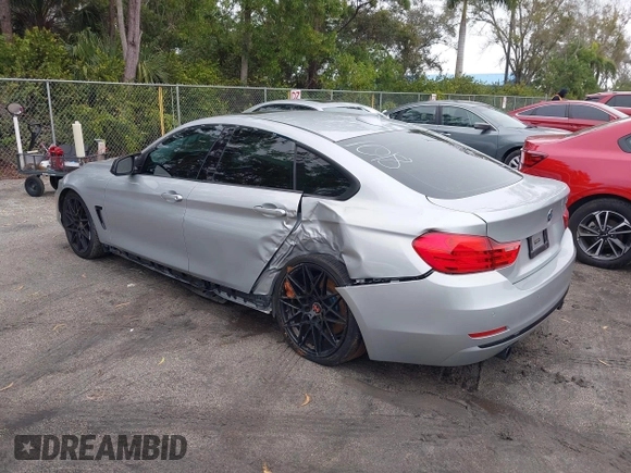 2015 BMW 4 Series 435i with VIN WBA4B1C58FG241018, listed as a IAAI auction lot 41401671 with 79,369 mi miles. Bid and sale history available at carsss.com. Image 3.