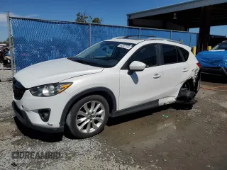 2014 Mazda CX-5 Grand Touring with VIN JM3KE4DY6E0363211, listed as a Copart auction lot 48352315 with 214,298 mi miles and Salvage Title. Bid and sale history available at DreamBid. Image 1.
