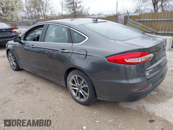 2019 Ford Fusion SEL with VIN 3FA6P0CDXKR129411, listed as a IAAI auction lot 42082323 with 126,048 mi miles and . Bid and sale history available at DreamBid. Image 3.