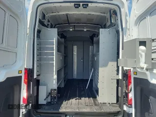 2023 Ford Transit Cargo with VIN 1FTBR1X87PKC01635, listed as a IAAI auction lot 42832727 with 17,348 mi miles and . Bid and sale history available at DreamBid. Image 41.