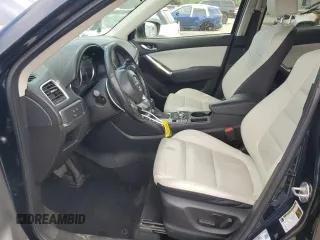 2016 Mazda CX-5 Grand Touring with VIN JM3KE4DY4G0750939, listed as a Copart auction lot 52727395 with 72,428 mi miles and Salvage Title. Bid and sale history available at carsss.com. Image 7.