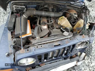 2001 Jeep Wrangler Sport with VIN 1J4FA49S01P363856, listed as a Copart auction lot 62494785 with 154,782 mi miles and Salvage title. Bid and sale history available at DreamBid. Image 13.