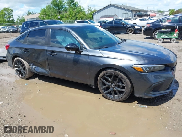 2022 Honda Civic Sport z VIN 2HGFE2F58NH560511, wystawiony jako IAAI lot #42346044 z przebiegiem 51 357 mil mil oraz . Historia ofert i sprzedaży dostępna na DreamBid. Obrazek 14.