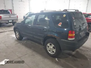 2003 Ford Escape XLT Popular with VIN 1FMYU03103KA06087, listed as a IAAI auction lot 42596326 with 210,441 mi miles and . Bid and sale history available at DreamBid. Image 3.