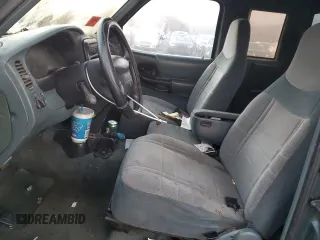 1997 Ford Ranger XL z VIN 1FTCR14A2VPA73865, wystawiony jako Copart lot #87299264 z przebiegiem 201 191 mil mil oraz Szkoda całkowita • Salvage title. Historia ofert i sprzedaży dostępna na DreamBid. Obrazek 7.
