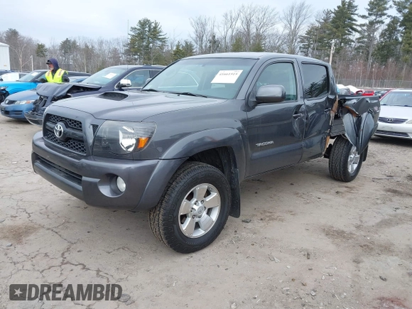 2011 Toyota Tacoma with VIN 3TMLU4EN9BM063918, listed as a IAAI auction lot 41661515 with 125,821 mi miles and . Bid and sale history available at DreamBid. Image 2.