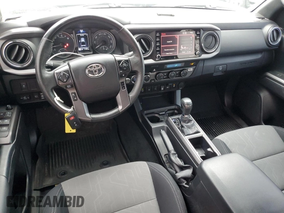 2021 Toyota Tacoma SR with VIN 3TMCZ5AN4MM402889, listed as a Copart auction lot 59942695 with 61,504 mi miles and Salvage title. Bid and sale history available at DreamBid. Image 8.