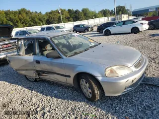 1999 Honda Civic LX with VIN 2HGEJ6672XH582409, listed as a Copart auction lot 44055475 with 0 mi miles and Salvage Title. Bid and sale history available at carsss.com. Image 4.