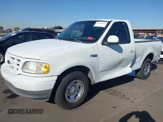 2003 Ford F-150 XL with VIN 1FTRF17293NA46808, listed as a IAAI auction lot 41156923 with 384,475 mi miles and . Bid and sale history available at DreamBid. Image 17.