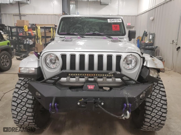 2022 Jeep Wrangler Unlimited Sahara with VIN 1C4HJXEG4NW164726, listed as a Copart auction lot 85481574 with 33,373 mi miles and Salvage Title. Bid and sale history available at carsss.com. Image 5.