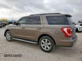 2018 Ford Expedition XLT with VIN 1FMJU1HT8JEA70326, listed as a Copart auction lot 57042785 with 123,249 mi miles and Salvage title. Bid and sale history available at DreamBid. Image 2.