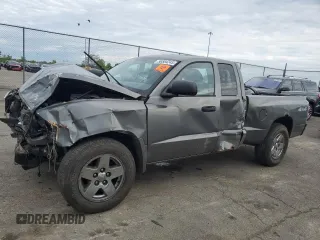 2006 Dodge Dakota SLT z VIN 1D7HW42N46S714511, wystawiony jako Copart lot #56504245 z przebiegiem 84 468 mil mil oraz Szkoda całkowita • Salvage title. Historia ofert i sprzedaży dostępna na DreamBid. Obrazek 1.