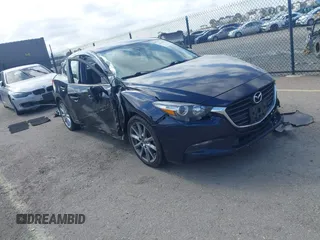 2018 Mazda 3 Touring z VIN 3MZBN1V35JM178131, wystawiony jako IAAI lot #42170599 z przebiegiem 95 716 mil mil oraz . Historia ofert i sprzedaży dostępna na DreamBid. Obrazek 1.