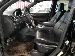 2019 Jeep Grand Cherokee Overland with VIN 1C4RJFCT8KC610341, listed as a Copart auction lot 83424454 with 57,356 mi miles and Salvage Title. Bid and sale history available at carsss.com. Image 7.