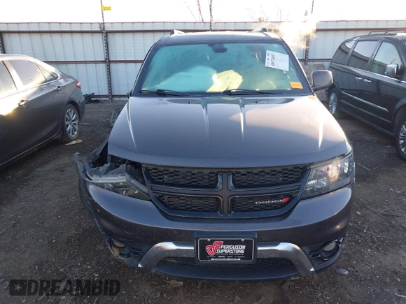 2018 Dodge Journey Crossroad with VIN 3C4PDDGGXJT386542, listed as a IAAI auction lot 40976857 with 147,853 mi miles and . Bid and sale history available at DreamBid. Image 12.