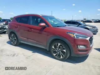 2020 Hyundai Tucson Sport with VIN KM8J33AL8LU163140, listed as a Copart auction lot 54367865 with 135,042 mi miles and Clean title. Bid and sale history available at DreamBid. Image 4.