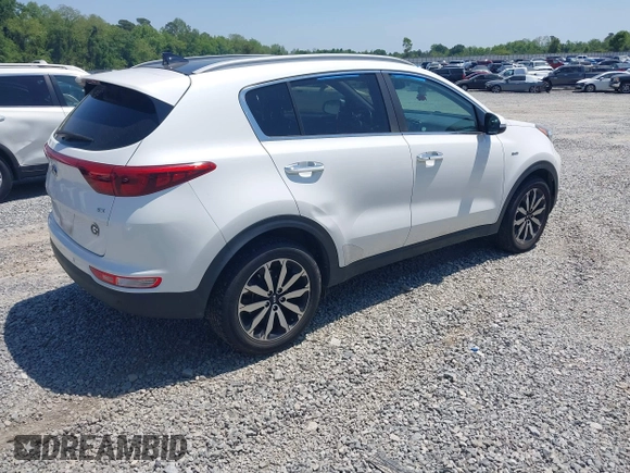 2017 Kia Sportage EX with VIN KNDPNCACXH7079500, listed as a IAAI auction lot 42051156 with 100,928 mi miles and . Bid and sale history available at DreamBid. Image 4.