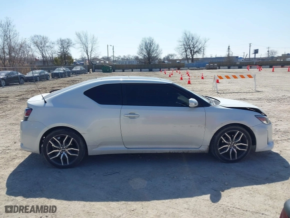 2016 Scion tC with VIN JTKJF5C70GJ019590, listed as a IAAI auction lot 41798426 with 69,045 mi miles. Bid and sale history available at carsss.com. Image 13.