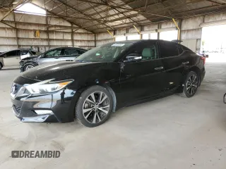 2017 Nissan Maxima Platinum with VIN 1N4AA6AP2HC448059, listed as a Copart auction lot 65264985 with 102,162 mi miles and Salvage title. Bid and sale history available at DreamBid. Image 1.