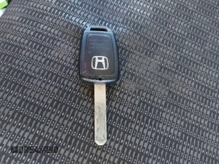 2016 Honda Fit LX with VIN JHMGK5H58GX003864, listed as a IAAI auction lot 41554364 with 258,819 mi miles. Bid and sale history available at carsss.com. Image 11.
