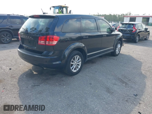 2013 Dodge Journey SE with VIN 3C4PDCAB0DT710609, listed as a IAAI auction lot 41763431 with 145,851 mi miles and . Bid and sale history available at DreamBid. Image 4.