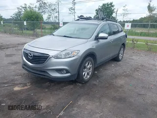 2015 Mazda CX-9 Touring z VIN JM3TB2CA1F0455916, wystawiony jako IAAI lot #42226924 z przebiegiem 157 643 mil mil oraz . Historia ofert i sprzedaży dostępna na DreamBid. Obrazek 2.