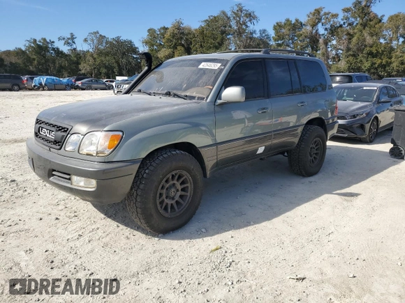 2002 Lexus LX 470 z VIN JTJHT00W723514716, wystawiony jako Copart lot #42646295 z przebiegiem 188 817 mil mil oraz Szkoda całkowita • Salvage title. Historia ofert i sprzedaży dostępna na DreamBid. Obrazek 1.